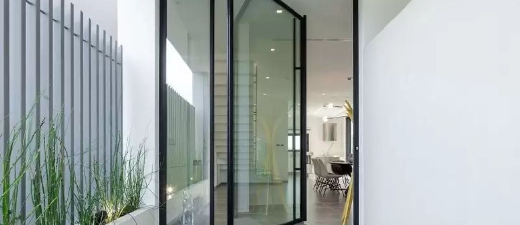 Casement vs. Pivot Aluminium Doors
